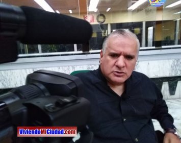 Joel Ramos en el Dia Munidal Pintor Boca y Pie